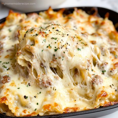 Sausage Alfredo Ravioli Lasagna, Sausage Ravioli Lasagna, Ravioli Recipe Alfredo, Rana Ravioli Recipe, Sausage Alfredo Lasagna, Four Cheese Ravioli Recipe, Sausage Alfredo Bake, Ravioli Cream Sauce, Sausage Lasagna Recipe