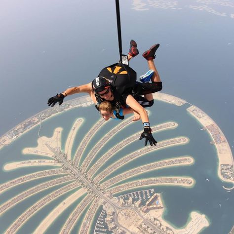 Jumping out of a plane over The Palm Jumeriah. Jumping Out Of A Plane, Skydiving, A Plane, The Palm, Tag A Friend, Helicopter, Bucket List, Dubai, Domain Name