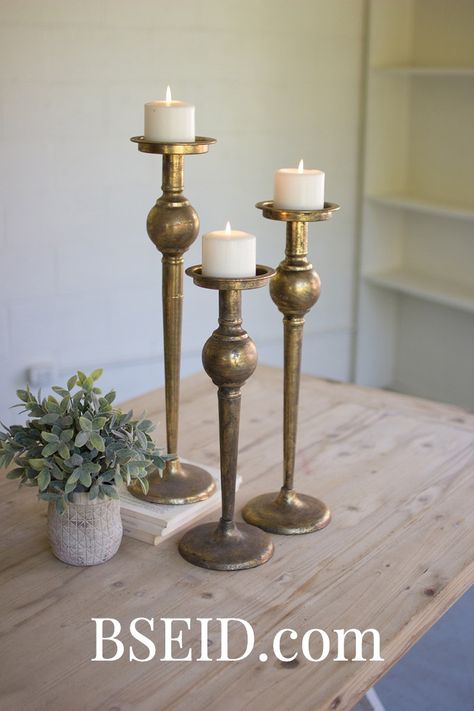 Add an intimate glow to a fall table with these antique brass candle sticks. Effortlessly elegant fall decor for living room, mantle or entry table. Metal Candle Stand, Candlestick Collection, Farmhouse Candle Holders, Painted Fox Home, Antique Brass Candlesticks, Farmhouse Candle, Farmhouse Style Lighting, Tall Candlesticks, Farmhouse Candles