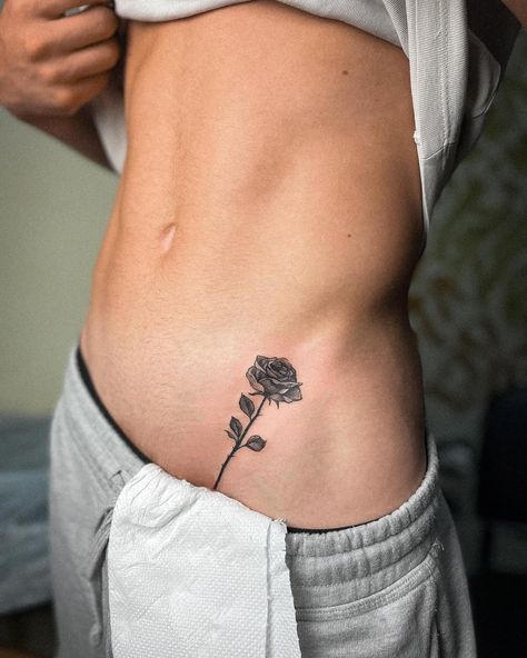 🌹 Rose #tattoorose #tattooalbania #rose #tattoos #tattoo #blacktattoo #tattooart #chutattoo #tattooink #tattooer #tattooartist Rose On Stomach Tattoo, Rose Tattoo Waist, Rose Tattoo Under Breast, Rose Tramp Stamp, Rose Vine Tattoo, Rose Vine Tattoos, Tramp Stamp Tattoos, Rose Tattoos For Women, Lower Stomach