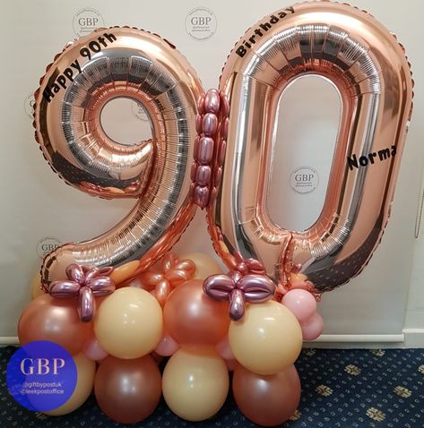 A beautiful Rose Gold 90th birthday balloon display ❤ #leekpostoffice #giftbypost #balloonsinleek #balloonsinstaffordshire #balloonsinderbyshire #balloonsinCheshire #birthdayballoons #90thbirthday #ballooninstallation #gardenpartydecor #gardenparty #balloons #rosegoldballoons 20 Balloons Number, 1993 Balloons, Foil Number Balloons Decoration, Link Balloons Amazon.com, Large Number Balloons, Balloon Numbers, Balloons Decor, Rose Gold Balloons, Balloon Display