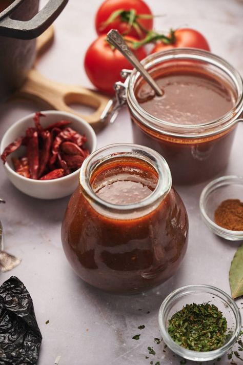 Learn how to make homemade birria sauce, also known as birria consome. It is spicy and smoky and makes the most delicious birria when combined with beef or chicken. Perfect for stew, tacos, enchiladas, and more. #condiment #freezerfriendly #makeahead #birriaconsome #birriasauce #homemadebirria Homemade Birria, Birria Sauce, Taco Sauce Recipes, Beef Birria Recipe, Mexican Sauce, Recipes With Enchilada Sauce, Slender Kitchen, Dipping Sauces Recipes, Taco Sauce