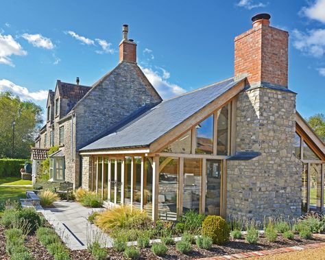 House extension ideas: 10 best designs to reinvent your home | Homes & Gardens | Orangery Conservatory, Oak Framed Extensions, Conservatory Extension, Orangery Extension, Cottage Extension, Conservatory Kitchen, Garden Room Extensions, Oak Framed Buildings, Magazine Feature