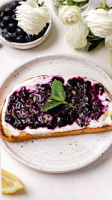 Mac / Balanced Healthy(ish) Recipes on Instagram: "Full recipe below👇🏼 Follow @healthylittlepeach for more yummy recipes! 🍋The other night I was craving lemon and blueberry so I came up with this delicious Lemon Blueberry Whipped Cottage Cheese Toast. It hit the spot and is currently my new obsession. I also love that it has 14 grams of protein in 1/2 cup serving of cottage cheese! I’ll be dreaming of this toast every night. This is your sign to make it…..Recipe below! 🫐Blueberry Jam🫐 3 1/2 Cottage Cheese Toast, Blueberry Toast, Whipped Cottage Cheese, Lemon And Blueberry, Cheese Toast, Blueberry Jam, New Obsession, Cheese Spread, Breakfast Brunch Recipes