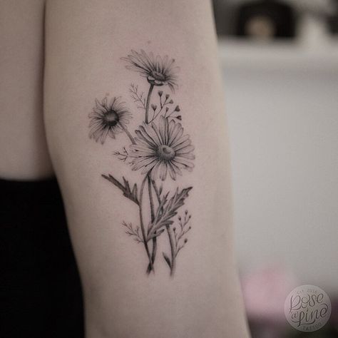 White Daisy Tattoo, Tattooed Arm, Daisy Chain Tattoo, Aster Tattoo, Small Daisy Tattoo, Word Tattoo Ideas, Daisy Tattoo Designs, Daisy Flower Tattoos, Wrap Around Tattoo