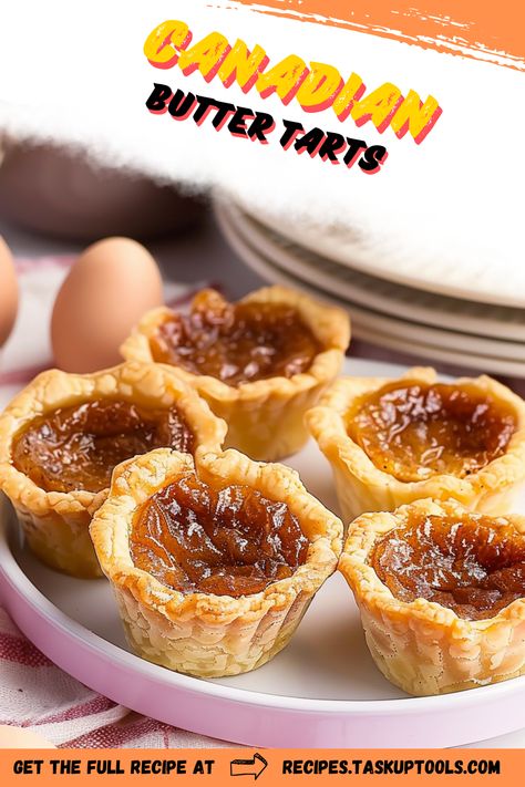 Discover the irresistible charm of Canadian butter tarts with our ultimate guide! These delectable treats feature a flaky pastry shell filled with a rich, buttery filling that melts in your mouth. Explore traditional recipes, creative variations, and tips for perfecting this Canadian classic. Whether youre a baking novice or a seasoned pro, our expert insights will inspire you to whip up your own batch of these sweet delights. Embrace the warmth of homemade desserts and delight your friends and family with the unforgettable taste of butter tarts Butter Tarts Canadian, Butter Tart Filling, Canadian Desserts, Canadian Butter Tarts, Tart Crust Recipe, Canadian Dessert, Canadian Dishes, Butter Tart, British Desserts