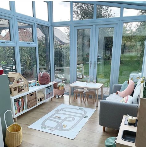 Four Seasons Playroom, Sunroom Playroom Ideas Cozy, Conservatory Toy Room Ideas, Playroom In Conservatory, Florida Room Playroom, Toy Room Conservatory, Small Conservatory Playroom Ideas, Kids Playroom Ideas Sunroom, Playroom Extension Ideas