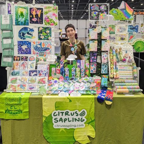 It's MCM weekend again!! You can find me at H04 in artist alley 💚 I've got new socks, patches, suncatchers, and bookmarks 👀 plus lots of prints and stickers!! Thanks for an amazing Friday, who will be there Saturday and Sunday? #mcmlondon #mcmcomiccon #artistalley #artistalleytable #conventionartist Art Market Table Display, Artist Alley Table Display, Comic Con Artist Alley, Art Merchandise Ideas, Artist Alley Setup, Artist Alley Display Ideas, Artist Alley Display, Art Market Display, Artist Alley Booth