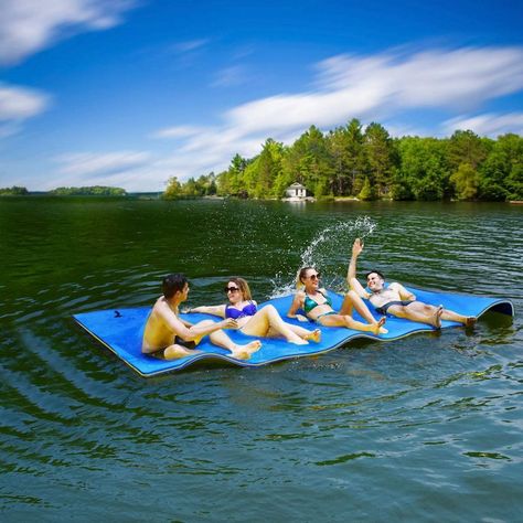 This Floating Water Pad Will Take Lake Day To The Next Level Floating Mat, Water Pad, Sport Pool, Water Mat, Pool Rafts, Floating Water, Swimming Tips, Lake Beach, Foam Mats