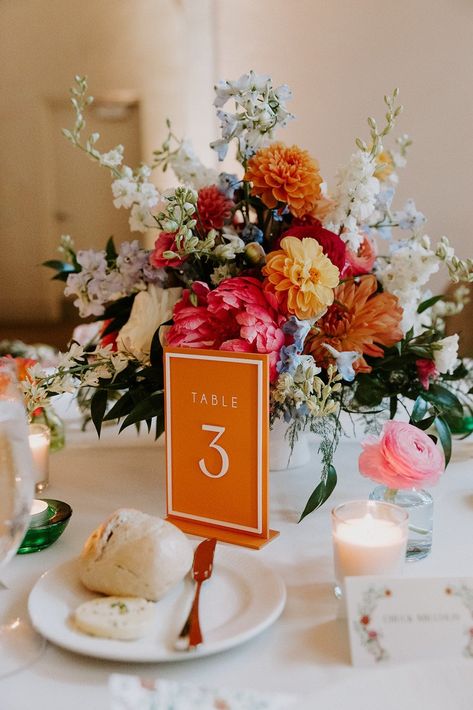 Wedding table numbers are a must have. Get these beauties in a large assortment of colors!  -- HOW TO ORDER -- *All lettering and numbers are default white except for white signs which will be black. Please message me for different color options* Select table numbers from drop down and if you would like the signs with a border. EXAMPLE: If you would like tables 1-15: select 1-5 and add to cart then go back to listing and select 6-10 and add to cart then go back and select 11-15 and add to cart T Floral Wedding Table Decor, Colorful Wedding Table, Table Decor Colorful, Elegant Mexican Wedding, Pink Table Numbers, Wedding Table Vases, Colored Table, Floral Wedding Table, Floral Table Numbers