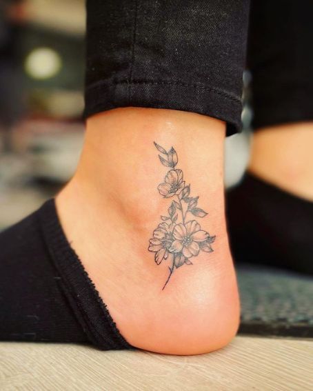 Friendship Ankle Tattoo, Birth Flower Anklet Tattoo, Vertical Ankle Tattoos For Women, Outter Ankle Tattoos For Women, Upper Ankle Tattoos For Women, Small Sunflower Tattoo On Ankle, Cover Ankle Tattoo, Country Ankle Tattoo, Mom Ankle Tattoo