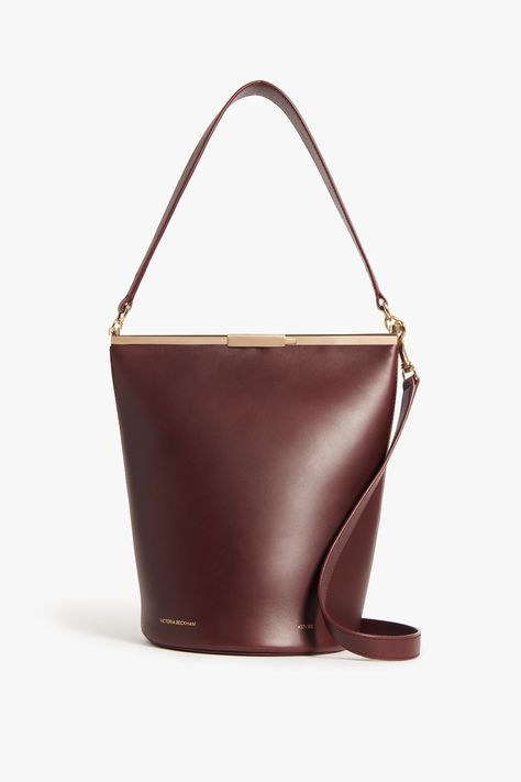 The Frame Bucket bag in Burgundy leather is distinguished by its smooth lines and hidden complexities. Designed to compliment your Autumn Winter 22 wardrobe Victoria Beckham Bags, High End Handbags, Victoria Beckham Collection, 90s Shoulder Bag, Burgundy Bag, Fluid Movement, Elevated Style, Deep Burgundy, Designer Shoulder Bags