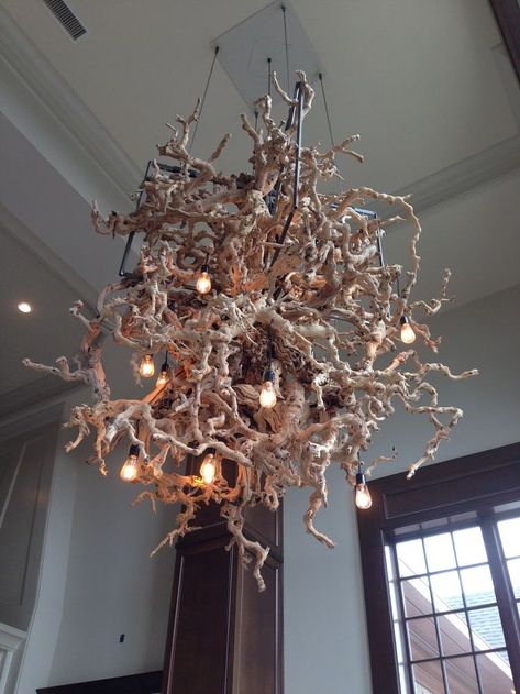 Suspended from a 30' high ceiling in a country club in Georgia, this custom chandelier is comprised of 500lbs of grape vine branches from a winery Tecture is a San Diego based Design and Fabrication studio focused on innovative and comprehensive design solutions. Vine And Branches, Custom Chandelier, Branch Decor, Design Solutions, High Ceiling, Country Club, Installation Art, Grape Vines, Tiny House