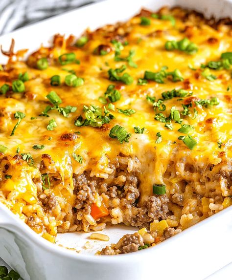 Delicious and comforting cheesy hamburger rice casserole with ground beef, tomatoes, and mozzarella, perfect for a family dinner. Hamburger Rice Casserole, Hamburger Rice, Casserole With Ground Beef, Tomatoes And Mozzarella, Cheeseburger Pie, Cheesy Rice, Slow Cooker Recipes Dessert, Creamy Mushroom Soup, Rice Casserole Recipes