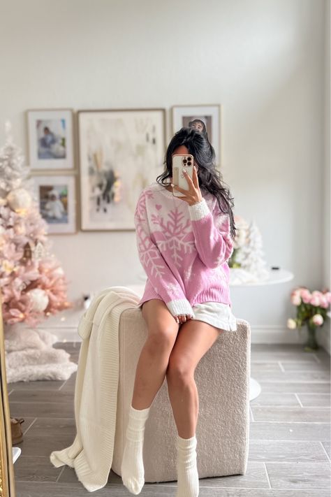 My coziest pink snowflake sweater is 30% off! Sweaters, pink sweater, christmas pink sweater, pink holiday sweater, snowflake sweater, sale on sweater, pink snowflake sweater, graphic sweater Pink Christmas Sweater Outfit, Pink Christmas Outfits Women, Pink Christmas Outfits, Pink Christmas Outfit, Christmas Sweater Outfit, Pink Sweater Outfit, Ugly Christmas Sweater Outfit, Christmas Photos Outfits, Snowflake Graphic