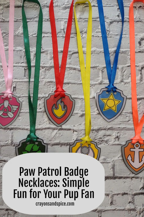 Is your child obsessed with Paw Patrol? If so, they will absolutely love these pup tag necklaces. They are made out of brightly colored ribbon and are held together by Velcro to make them safer for all ages. I made a bunch of them for my daughter's Paw Patrol party as game prizes. Several months later and my kids still play with them quite often. I made Rocky, Zuma, Skye, Marshall, Rubble, and Chase ones, but you can make them for any pup. #PawPatrol #necklaces #badges | crayonsandspice.com Paw Patrol Badges Diy, Paw Patrol Badge Template, Chase Paw Patrol Party Ideas, Paw Patrol Pup Tags, Diy Skye Paw Patrol Headband, Diy Liberty Paw Patrol Costume, Paw Patrol Snacks For Party, Paw Patrol Dress Up, Paw Patrol Badge Printable