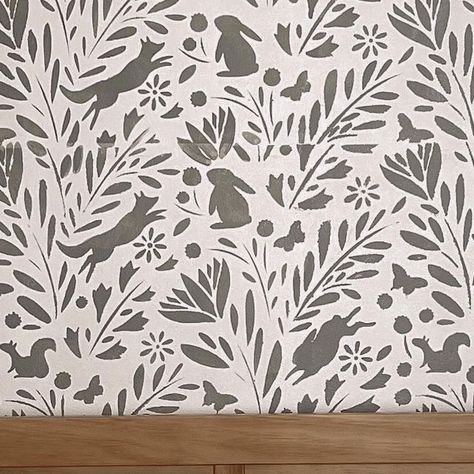 Alisha Galvin | petite style on Instagram: "When wallpaper costs $900 but this project costs less than $100 I always wanted wallpaper in baby G’s nursery, but couldn’t justify the price. I stumbled upon these stencils from @stencilrevolution and they fit my woodland vision perfectly!" Woodland Stencil Wall, Nursery Woodland Wallpaper, Watercolor Woodland Wallpaper, Gender Neutral Nursery Wallpaper Woodland, Woodland Stencil, Tiny Laundry Rooms, Woodland Wall, Wallpaper Stencil, Baby G