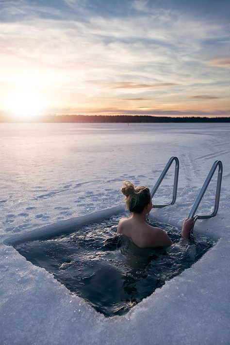 Woman swimming in an ice hole in Finland Finland Travel, Nordic Countries, Travel Goals, Helsinki, Scandinavia, The Snow, Travel Dreams, Winter Wonderland, Places To See