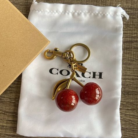 Coach Glitter Resin Red Cherry Bag Charm Keychain Keychain Cherry Coach Charm, Coach Cherry Bag Charm, Cherry Bag Charm, Coach Cherry Charm, Cute Car Keychains, Fall Trinkets, Coach Bag Charm, Coach Cherry Bag, Cherry Coded