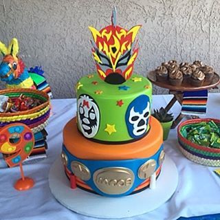 Luchador themed cake! #tagteam @jarrr_ #gemmamontana #hemakescakestoo #elemakescakes #luchadorcake #luchador #customcake #specialtycake thanks for the picture Valerie! Luchador Cake, Luchador Party, Popular Instagram Hashtags, Lucha Libre Party, Wrestling Birthday Parties, Wrestling Birthday, Wrestling Party, Wwe Birthday Party, Wwe Party