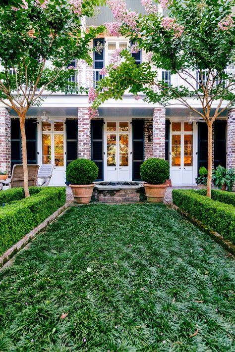 Tour a Formal Charleston Walled Garden | HGTV Estilo Charleston, Shell Garden, Italian Cypress Trees, Landscaping Shrubs, Charleston Gardens, Italian Cypress, Brick Pathway, Southern Garden, Walled Garden