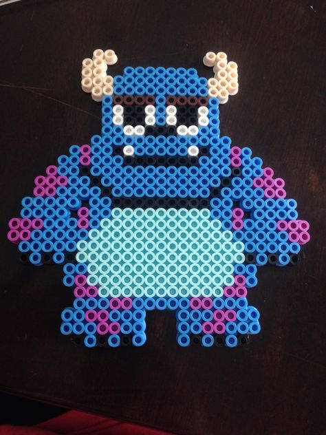 Sully from Monsters Inc. perler bead Sully Perler Bead Patterns, Sully Perler Beads, Sullivan King Perler, Disney Perler Bead Patterns, Sully From Monsters Inc, Buu Monster Inc, Pearl Beads Pattern, Easy Perler Beads Ideas, Fuse Bead Patterns