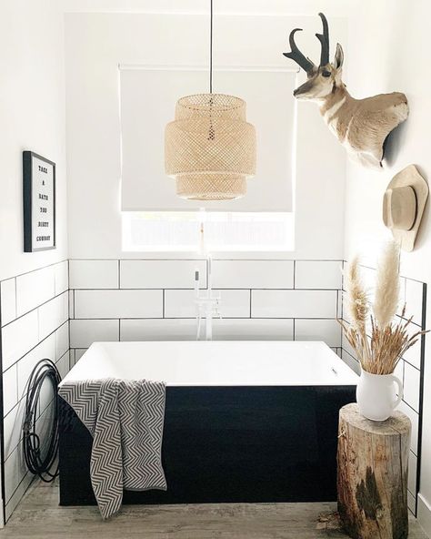 While not the obvious lighting choice, pendants look great in bathrooms. You can center them over a sink, install one over a bathtub or place a trio o... | Make Your Bathtub the Star Over The Bathtub Lighting, Bathtub Pendant Light, Lights Over Bathtub, Bathtub Lighting Fixture, Pendant Over Bathtub, Pendant Light Over Bathtub, Light Fixture Over Bathtub, Light Over Bathtub, Chandelier Over Bathtub