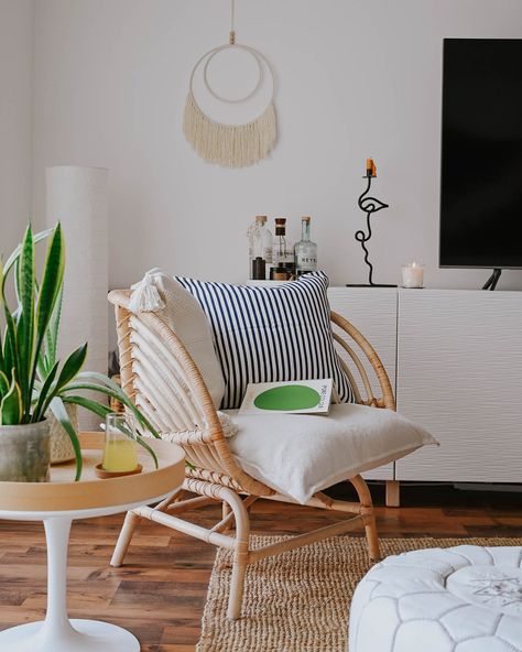 Warm Scandi Boho inspired reading corner in a contemporary living room Ikea Buskbo, Boho Reading Corner, Scandi Armchair, Scandi Boho Living Room, Tulip Side Table, Artisan Textiles, Scandi Boho, Backstrap Loom, Rattan Armchair