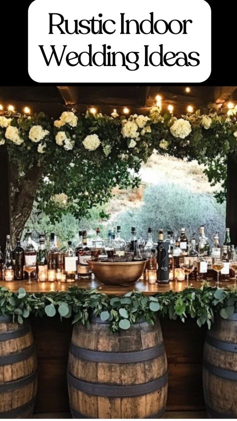 Elegant rustic wedding reception with wooden barrel tables decorated with greenery and candles indoors. Rustic Inside Wedding, Rustic Cocktail Wedding Reception, Rustic Micro Wedding, Indoor Rustic Wedding, Simple Wedding Decorations Indoor, Fall Barn Wedding Ideas, Small Country Wedding, Elegant Rustic Wedding Ideas, Vineyard Reception