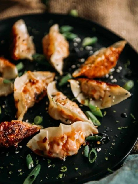 Homemade Salmon Dumplings Story - Girl Carnivore Garlic Ginger Chicken, Best Dumplings, How To Make Dumplings, Apple Slaw, Grilled Flank Steak, Ginger Chicken, Seasoned Rice, Super Bowl Party, Exotic Food