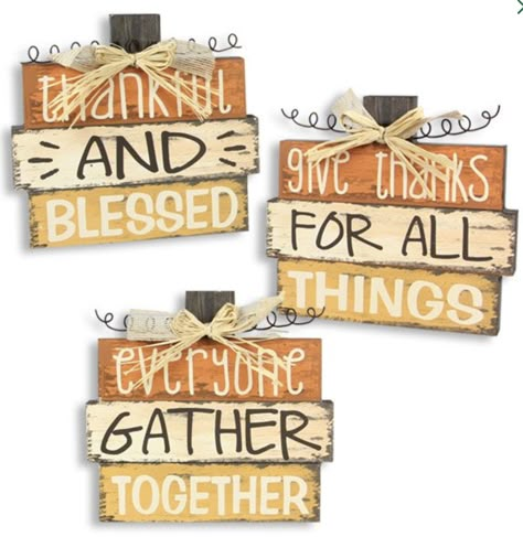 Place these wooden block signs on a shelf, table, desk, or counter to decorate your home for fall or Thanksgiving. Each sign has a rustic stacked block design and features an inspirational saying. Painted in fall colors of orange, brown, and gold, the signs have a worn, faded look. A raffia bow and metal accents top off each sign. Sold in increments of 3 block signs with assorted phrases: Everyone gather together, Give thanks for all things, and Thankful and blessed. Each sign measures 8 inches Scrapbook Cards Ideas, Ideas For Scrapbook, Thanksgiving Wood Crafts, Fall Festival Decorations, Fall Craft Fairs, Fall Crafts For Adults, Blessed Thanksgiving, Cards Tutorial, Fall Wood Crafts