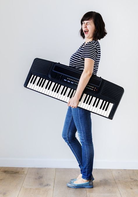 Caucasian woman holding an electronic keyboard | free image by rawpixel.com Keyboard Pose Reference, Keyboardist Aesthetic, Keyboard Photography, Piano Pictures, Partition Designs, Band Photoshoot, Musician Photography, Person Photo, Senior Photography Poses