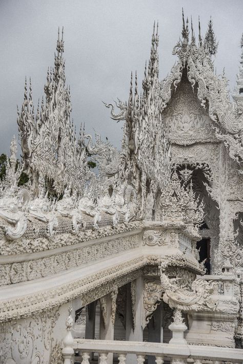 This White Temple In Thailand Is Both Heaven And Hell Wat Rong Khun, Temple Thailand, Beautiful Temple, White Architecture, 2k Wallpaper, White Temple, Flatiron Building, Chiang Rai, Heaven And Hell