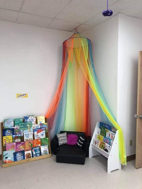 Reading Corner Preschool, Rainbow Reading Corner, Open House Treats, Rainbow Theme Classroom, Daycare Setup, Reading Corner Classroom, Sensory Classroom, Home Daycare Ideas, Elementary Classroom Themes