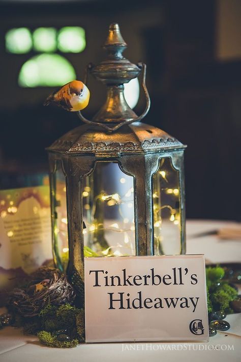 Peter Pan Themed Wedding table centerpieces. Each table was a different location from the book. Peter Pan Wedding, Disney Centerpieces, Disney Wedding Centerpieces, Fairytale Wedding Decorations, Disney Themed Wedding, Wedding Table Themes, Lantern Decor Wedding, Peter Pan Party, Disney Wedding Ideas