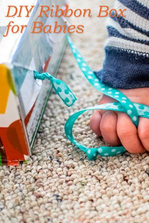 Homemade toys for kids: Make a quick and simple DIY ribbon box for your baby! Homemade Toys For Kids, Homemade Baby Toys, Baby Band, Baby Toys Diy, Baby Play Activities, Ribbon Box, Homemade Toys, Toddler Play, Fun For Kids