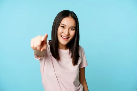 Free Photo | Its you smiling happy asian woman pointing finger at camera congratulating inviting people standing ... Hand On Head, Pointing Finger, Sisters Photoshoot Poses, Asian Models Female, Pointing Fingers, Girl Thinking, Smile Girl, Sale Banner, Aesthetic Images