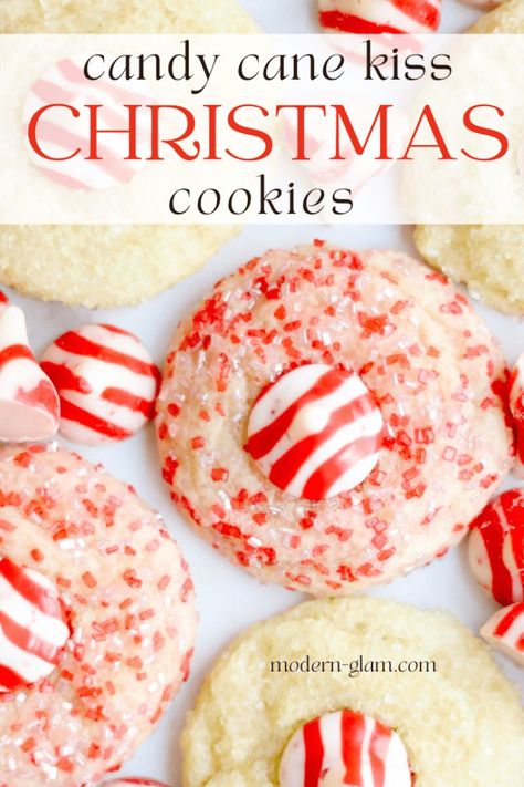 Christmas cookies recipe. Make these nut-free version of the popular Peanut Blossoms. White chocolate candy cane kisses dot yummy sugar cookies flavored with peppermint and rolled in colored sugar for the perfect christmas cookie recipe. Peanut Blossom Cookies, Candy Cane Cookie Recipe, Cranberry Orange Cookies, Cookies With White Chocolate, Chewy Molasses Cookies, White Chocolate Candy, Christmas Cookies Gift, Yummy Sugar Cookies, Delicious Christmas Cookies