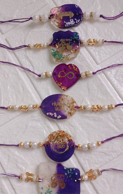 Handmade resin rakhi Starting 75 rs Resin Rakhi Designs, Resin Rakhi Ideas, Handmade Rakhi Designs, Resin Arts, Raksha Bandhan Gifts, Doll Miniatures, Handmade Rakhi, Rakhi Design, Book Crafts Diy