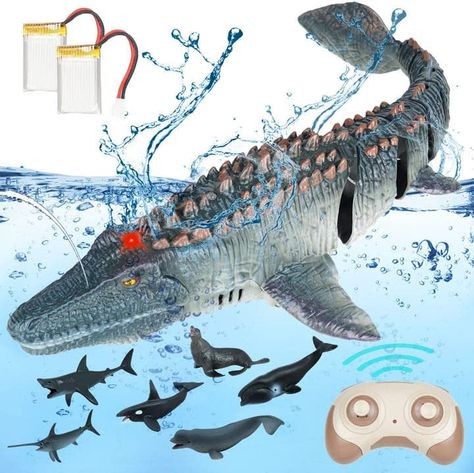 Ships within 24 Hours or Less! Remote Control Mosasaurus, Dinosaur Toys for Kids 5-7 with 2pcs Rechargeble Batteries and 6 Sea Animals, 2.4Ghz RC Mosasaurus Toy in Water, Pool, for 3+ Year Old Boys Girls Kids Shop at https://www.howdytoy.com/product/remote-control-mosasaurus-dinosaur-toys-for-kids-5-7-with-2pcs-rechargeble-batteries-and-6-sea-animals-2-4ghz-rc-mosasaurus-toy-in-water-pool-for-3-year-old-boys-girls-kids Cute Overall Outfits, Dinosaur Toys For Boys, Boys Game Room, Jewelry Packaging Design, Best Christmas Toys, Dinosaur Toys For Kids, Kids Play Set, Batman Birthday Party, Cool Gadgets For Men