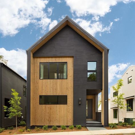 Brightwater Homes on Instagram: "Style: Scandinavian | Description: Dreamy 😍 Inspired by Scandinavian architecture, this Brightwater home at Serenbe makes a bold statement with sleek lines and a geometric combination of horizontal lap siding in deep charcoal with vertical siding in warm natural wood. . . . #AtlantaHomesAndLifestyles #ScandinavianDesign #ScandinavianHome #ScandinavianModern #ScandinavianLiving #ScandinavianStyle #ScandinavianInspired #Farmhouse #ModernFarmhouse #Serenbe" Scandanavian House Design Exterior, Scandinavian Wooden House, Scandinavian Farmhouse Exterior, Scandinavian Exterior House, Scandinavian Facade, Scandinavian Architecture Traditional, 2 Story Scandinavian House, Scandanavian House Plan, Scandinavian Home Exterior