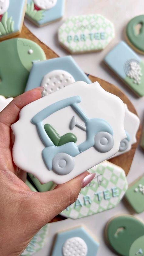 Watch me decorate this cute golf cart ⛳️ . . . . . #cookiereel #cookievideo #cookiedecoratingvideo #cookietutorial #cookiedecoratingreel #royalicingcookies #royalicing #instacookies #customcookies #cookiesofinstagram #designercookies #instacookies #sugarcookies #videooftheday #oddlysatisfyingvideo #golf #golfcookies #golfcart | South Bay Custom Cookies - Rosa | The Daughters Of Eve · Hey Lover Masters Golf Cookies Decorated, Golf Cart Cookies Decorated, Golf Cookies Royal Icing, Golf Baby Shower Cookies, Golf Birthday Cookies, Golf Themed Cookies, Hole In One First Birthday Cookies, Hole In One Cookies, Masters Cookies