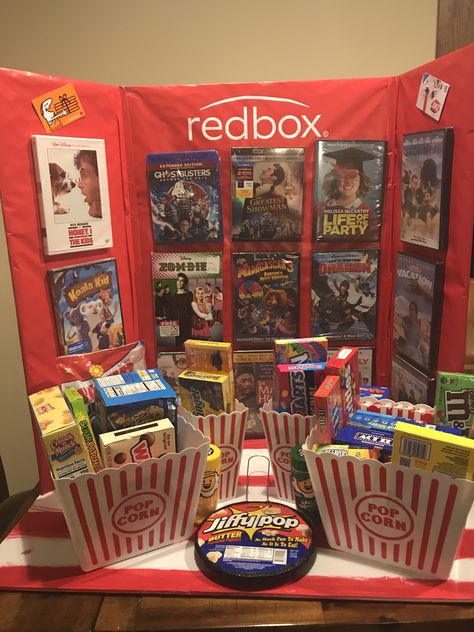 Redbox themed gift basket for a silent auction Action Basket Ideas Silent Auction, Movie Night Auction Basket, Family Game Night Auction Basket, Movie Theme Basket Ideas Silent Auction, Family Fun Basket Ideas Silent Auction, Class Auction Basket Themes, Auction Basket Themes, Redbox Gift, Basket Themes