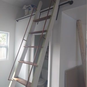 Diy Loft Ladder, Loft Ladder Ideas, Library Loft, Ladder Stand, Diy Loft, Inside Bar, Ladder Stands, Power Coating, Library Ladder