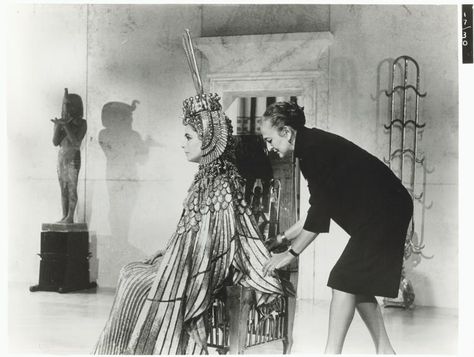 Irene Sharaff dressing Elizabeth Taylor for the motion picture Cleopatra. 1961-1962, Billy Rose Theatre Collection. Irene Sharaff, Elizabeth Taylor Cleopatra, Cleopatra 1963, American Costume, Costume Design Sketch, Amazing Costumes, Film Costumes, Best Costume Design, Celebrity Prints