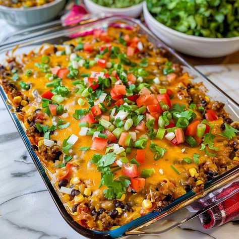 Taco Bake Casserole: A family favorite with layers of flavor. Ready in 45 mins, serves 6. A tasty, hearty meal. Taco Bake Casserole, Easy Weeknight Dinner Ideas, Taco Casserole Bake, Weeknight Dinner Ideas, Buffalo Chicken Sandwiches, Taco Bake, Chicken Sandwich Recipes, Taco Casserole, Baked Casserole