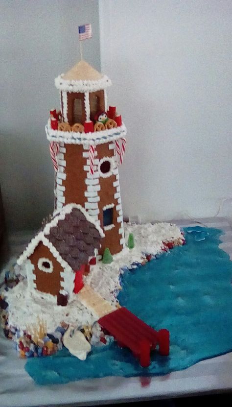 Titanic Gingerbread House, Gingerbread Lighthouse Template, Lighthouse Gingerbread House, Gingerbread Building Ideas, Ginger Bread House Ideas Creative, Gingerbread Boat, Gingerbread Building, Gingerbread Lighthouse, Gingerbread City