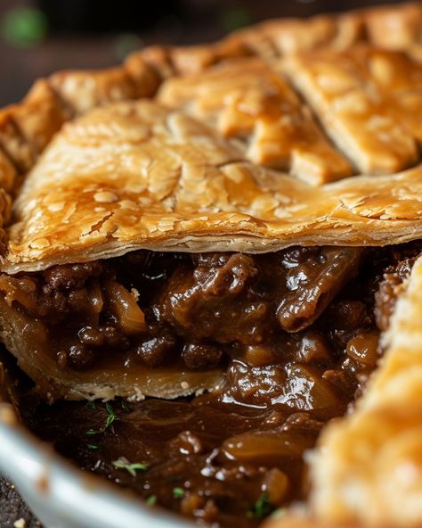 We learned about "Guinness Pie" 2 years ago and made it dozens of times! So good! Guinness Pie Recipe, Guinness Beef Pie, Beef Stew Pie, Steak And Guinness Pie, Beef And Guinness Pie, Guinness Pie, Turkey Stew, Venison Stew, Guinness Beef Stew