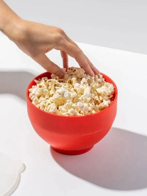 W&P Popper Popcorn Bowl Review: This Microwave Popcorn Popper Bowl Changed My Snack Game in 2022 | SELF Crushed Ice Maker, Theater Popcorn, Microwave Popcorn Popper, Movie Theater Popcorn, Perfect Popcorn, Popcorn Bowl, Popcorn Popper, Microwave Popcorn, Silicone Bowl