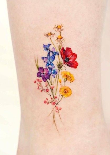 Delicate Rose Tattoos For Women, Wildflowers Tattoo Color, Colourful Floral Tattoo, Rainbow Wildflower Tattoo, September Birth Flower Tattoo Color, Bouquet Of Flowers Tattoo Color, Wildflower Tattoo Colorful, Floral Bouquet Tattoo Color, Colorful Flower Bouquet Tattoo